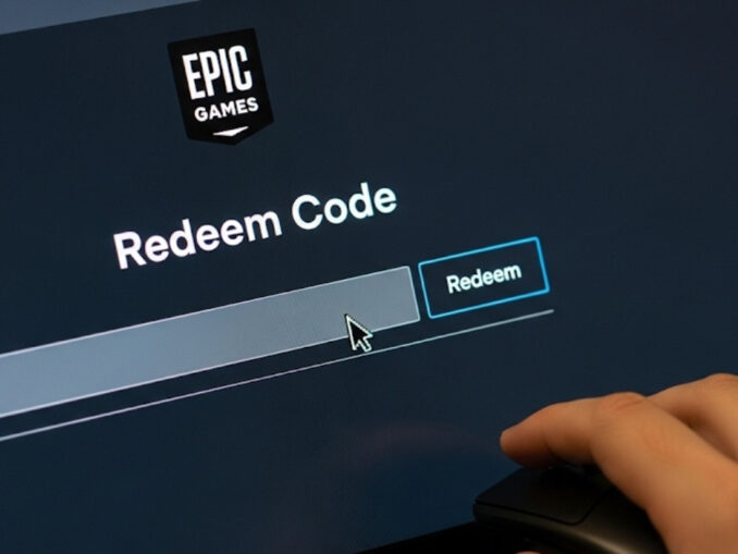 Una mano pronta a digitare un codice di riscatto su una tastiera, con lo schermo di un computer che mostra la pagina dedicata sul sito di Epic Games.
